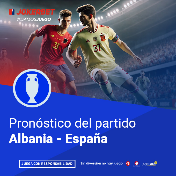 La imagen muestra a jugadores de los equipos de Albania y España en acción en un estadio iluminado y lleno de espectadores. En la parte inferior, dentro de un recuadro azul, se lee el texto 